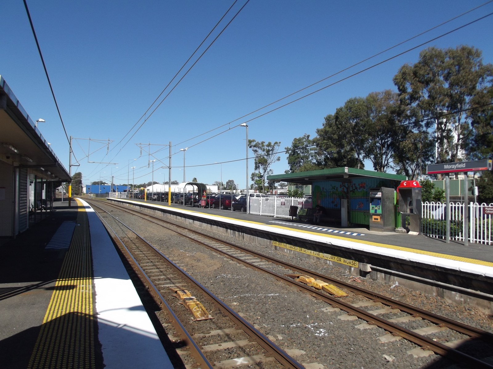 Morayfield station platforms and railway tracks in July 2012